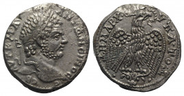Caracalla (198-217). Mesopotamia, Carrhae. AR Tetradrachm (27mm, 13.61g, 12h). AD 215-7. Laureate head r. R/ Eagle standing facing on bull’s head flan...