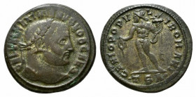 Galerius (Caesar, 293-305). Æ Follis (28mm, 12.56g, 6h). Thessalonica, 298-9. Laureate head r. R/ Genius standing l., holding patera and cornucopia; T...