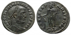 Galerius (305-311). Æ Follis (25mm, 7.18g, 6h). Heraclea, c. 310-1. Laureate bust r. R/ Genius standing facing, head l., holding cornucopia and patera...