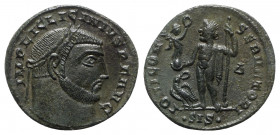 Licinius I (308-324). Æ Follis (21mm, 2.96g, 1h). Siscia, 315-6. Laureate head r. R/ Jupiter standing l., holding globe surmounted by Victory, leaning...