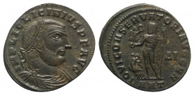 Licinius I (308-324). Æ Follis (22mm, 3.92g, 12h). Antioch, 315-6. Laureate head r. R/ Jupiter standing l. holding Victory on a globe and sceptre; at ...