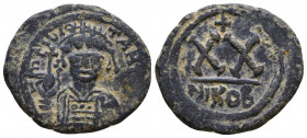 Maurice Tiberius. 582-602. AE 
Reference:
Condition: Very Fine

Weight: 5.4 gr
Diameter: 25 mm