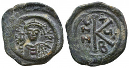 Maurice Tiberius. 582-602. AE 
Reference:
Condition: Very Fine

Weight: 5.2 gr
Diameter: 24 mm
