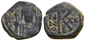Maurice Tiberius. 582-602. AE 
Reference:
Condition: Very Fine

Weight: 4.9 gr
Diameter: 20 mm