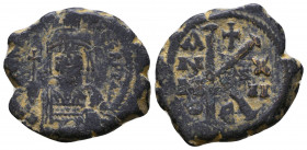 Maurice Tiberius. 582-602. AE 
Reference:
Condition: Very Fine

Weight: 6.1 gr
Diameter: 21 mm
