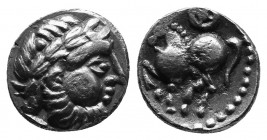 CELTIC, Eastern Europe AR Drachm. Dachreiter Type. Circa 3rd century BC. Celticised, laureate and bearded head to right / Stylised horse to left; whee...