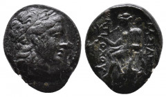 Seleukid Empire, Antiochos II Theos Æ 3,68gr. Antioch on the Orontes, 261-246 BC. Laureate head of Apollo to right / BAΣIΛEΩΣ ANTIOXOY Apollo seated t...