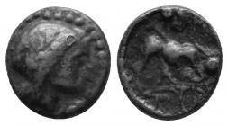 Uncertain Asia minor mint. 1st cent. BC. AE 2,47gr. Head of Apollo? to right / Bull kneeling to roght; some letters below