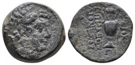 Seleukid Kings of Syria. Antiochos VI Dionysos AE 8.41gr, 144-142 BC. Apameia? mint. Av.. Radiate and diademed head right Rv.: Kantharos; ΓI left, sma...