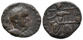 Uncertain mint in Asia Minor, Elagabal (218-222) AE 9,82gr. Laureate head of Elagabalus right / Roma or Athena seated left, holding Nike and sceptre, ...