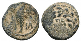 JUDAEA, Procurators. Porcius Festus, 59-62 AD. AE Prutah 1,65gr yr. 5. Inscription in wreath / Palm-branch. Hen.1351. VF, green patina.