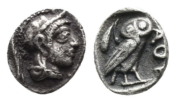 (Silver. 0.31g. 6mm) Attica. Athens circa 454-404 BC. Obol AR
Helmeted head of ...
