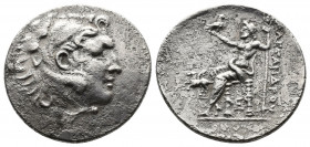 (Silver.15.88g. 33mm) KINGDOM OF MACEDON. Alexander III, 336-323 BC. Tetradrachm of Alabanda.
 Head of Alexander wearing lion skin headress
Rev: Zeu...
