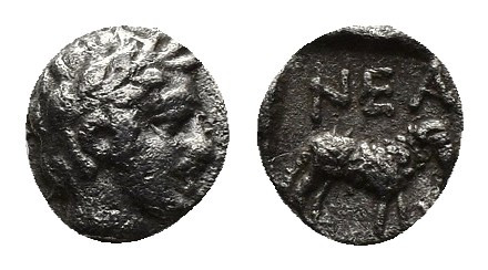 (Silver. 0.56g. 9mm) Troas. Neandria circa 400-300 BC. Obol AR
Laureate head of...