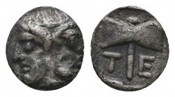 (Silver. 0.58g. 8mm) TROAS. Tenedos. Obol (Late 5th-early 4th centuries).
Janiform head of a diademed female left and laureate male right.
Rev: T - ...