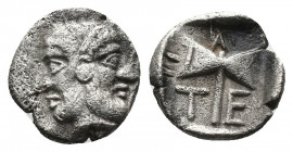(Silver. 0.62g. 10mm) TROAS. Tenedos. Obol (Late 5th-early 4th centuries).
Janiform head of a diademed female left and laureate male right.
Rev: T -...