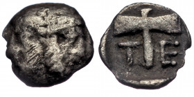 (Silver.Islands off Troas. Tenedos 450-387 BC. Obol AR
Janiform head, female on left, male on right
Rev: T-E, double axe, all within shallow incuse ...