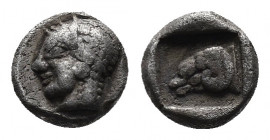 (Silver. 0.66g. 8mm) TROAS, Kebren. 5th century BC. AR obol 
Archaic head of female left
Rev: Head of ram right within incuse square. 
SNG Arikantü...