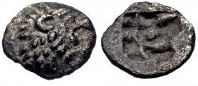 (Silver. 0.11g6mm) ASIA MINOR. Uncertain mint. 5th century BC. Tetartemorion.
Head of a roaring lion to right. 
Rev. Rough incuse square