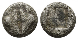 (Silver. 1.07g. 9mm) LESBOS, uncertain mint. 500-450 BC. Obol. 
Two boars’ heads confronted.
Rev: Quadripartite incuse square. 
Rosen.542. SNG.Cop....
