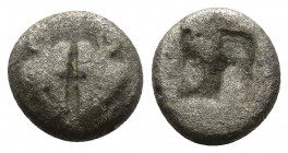 (Silver. 1.02g. 10mm) Lesbos. Uncertain mint circa 500-450 BC. Obol AR
Confronted boar\'s heads 
Rev: Quadripartite incuse square.
Klein 349.