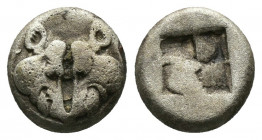 (Silver. 1.06g. 10mm) Lesbos. Uncertain mint circa 500-450 BC. Obol AR
Confronted boar\'s heads 
Rev: Quadripartite incuse square.
Klein 349.