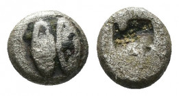 (Silver. 0.33g. 7mm) Lesbos, uncertain mint AR Tetartemorion, ca 450 BC.
Two eyes (or grains?)
Rev: Irregular incuse square punch.
SNG München 651-...