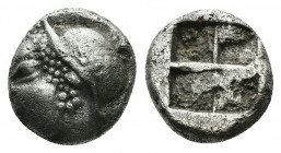 (Silver. 1.26g. 10mm) IONIA. Phokaia. Obol (Circa 521-478 BC).
Archaic head of Athena left.
Rev: Quadripartite incuse square.
 CNG 177, 109.