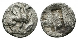 (Silver. 0.30g. 9mm) Ionia, Teos AR Obol. Circa 500-460 BC. 
Griffin seated right.
Rev: Quadripartite incuse square. 
Balcer 69; SNG Copenhagen -; ...