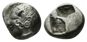 (Silver. 1.40g. 9mm) IONIA. Phokaia. Obol (Circa 521-478 BC).
Archaic head of Athena left.
Rev: Quadripartite incuse square.
 CNG 177, 109.