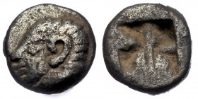 (Silver. 0.17g. 5mm) IONIA, Phokaia. 510-494 BC. AR Tetartemorion 
Archaic female head
Rev: Quadripartite incuse square.
SNG.Kay.522.