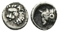 (Silver. 0.45g. 9mm) Karia, Uncertain mint AR Obol. Circa 400-340 BC. 
Head of lion facing slightly left 
Rev: Head of bull left, symbol on neck. 
...