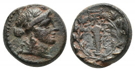 (Bronze. 3.85g. 15mm) LYDIA. Sardes. Ae (2nd-1st centuries BC).
Laureate head of Apollo right.
Rev: Club right within wreath; monogram 
SNG Copenag...
