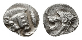 (Silver. 0.72 g. 13mm) Mysia, Kyzikos AR Hemiobol. c. 550-500.
 Forepart of boar left tunny behind.
Rev: Head of lion left, lion’s head facing above...