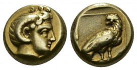 (Gold/Electrum. 2.54g. 12mm) LESBOS. Mytilene. EL Hekte (Circa 377-326 BC).
Head of Apollo Karneios right, with horn of Ammon.
Rev: Eagle standing r...