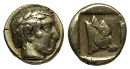 (Gold/Electrum. 2.53g.12mm) LESBOS. Mytilene. EL Hekte (Circa 454-427 BC).
Laureate head of Apollo right.
Rev: Head of cow right within incuse squar...