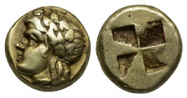 (Gold/Electrum. 2.54g. 11mm) Ionia, Phokaia EL Hekte. Circa 450-400 BC. 
Head of young satyr with ivy wreath left, seal below
Rev: Quadripartite inc...