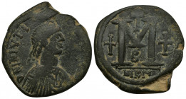 (Bronze, 15.00g, 32mm) JUSTIN I (518-527). Follis. Nicomedia.
Diademed, draped and cuirassed bust right.
Rev: Large M between two crosses; cross abo...
