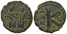 Justin II and Sophia AE24 Half follis (Bronze,7.35g, 24mm) Antioch. 
Obv: Legend illegible - Justin left and Sophia right, seated facing on double-th...