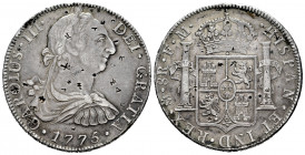 Charles III (1759-1788). 8 reales. 1776. México. FM. (Cal-1109). Ag. 26,77 g. Chop marks. Choice VF. Est...110,00. 

Spanish Description: Carlos III...