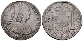 Charles IV (1788-1808). 8 reales. 1799. México. FM. (Cal-963). Ag. 26,83 g. Shield of Portugal counterstamp. Scarce. Almost VF/VF. Est...220,00. 

S...