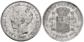 Centenary of the Peseta (1868-1931). Alfonso XIII (1886-1931). 1 peso. 1895. Puerto Rico. PGV. (Cal-128). Ag. 24,96 g. Light stains. Cleaned. Almost X...