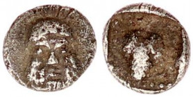 Lesbos, Methymna(?) AR Trihemitartemorion. Circa 600 BC.
Lesbos, Methymna(?) AR Trihemitartemorion. Circa 600 BC. Head of Silenos facing / Grape bunch...