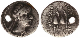 BAKTRIA, Greco-Baktrian Kingdom. Eukratides I Megas. Circa 170-145 BC. AR Obol (12mm, 0.67 g, 12h). Diademed and draped bust right / Caps of the Diosk...
