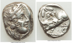 ATTICA. Athens. Ca. 393-294 BC. AR tetradrachm (23mm, 16.99 gm, 8h). Choice Fine, countermarks. Late mass coinage issue. Head of Athena with eye in tr...