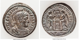 Constantine I the Great (AD 307-337). AE3 or BI nummus (18mm, 3.47 gm, 11h). AU. Ticinum, AD 318-319. IMP CONSTAN-TINVS MAX AVG, laureate, helmeted, a...