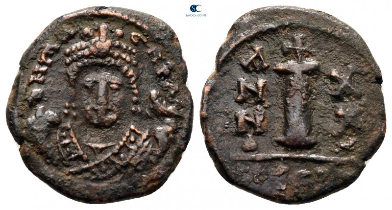 Maurice Tiberius AD 582-602. Theoupolis (Antioch)
Decanummium Æ

14 mm, 2,28 ...