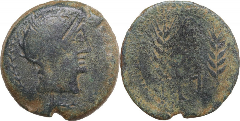 Hispania. Carmo. AE As, 80 BC. Obv. Helmeted head to right. Rev. Legend between ...