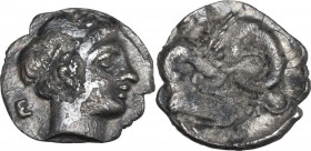 Greek Italy. Central and Southern Campania, Neapolis. AR Obol 10 mm. 320-300 BC. Obv. Male head, right. Rev. Herakles strangling Nemean lion, right. H...