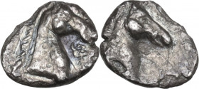 Greek Italy. Southern Apulia, Tarentum. AR 3/4 Obol, c. 325-280 BC. Obv. Head of horse, right. Rev. Head of horse, right. HN Italy 981. AR. 0.30 g. 8....